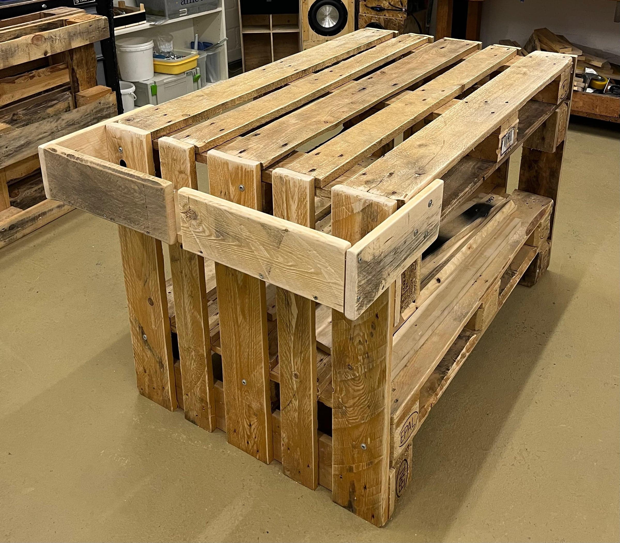 Pallet-wood kitchen island with a two-tier shelf